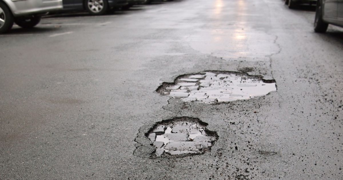 Who Is Liable for a Pothole Car Accident?
